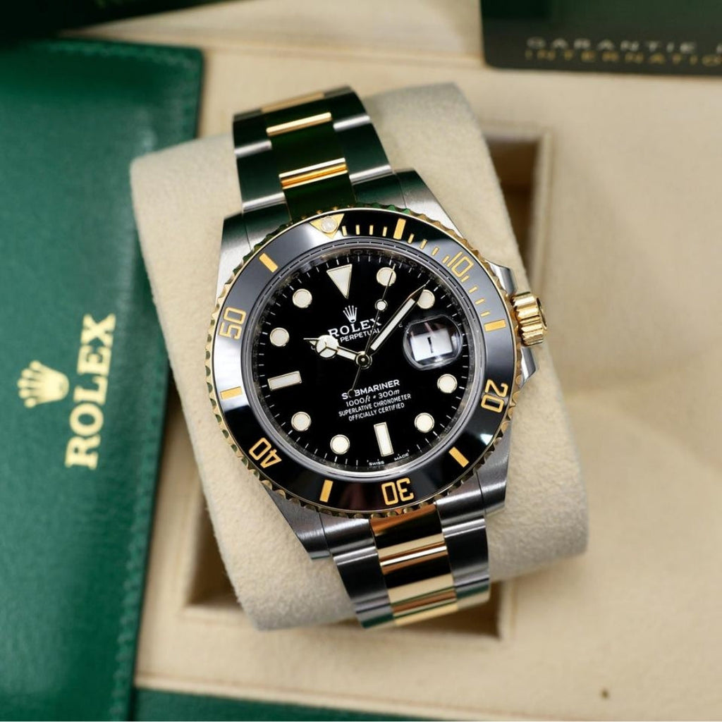 Rolex Submariner Date Black and Gold Oyster