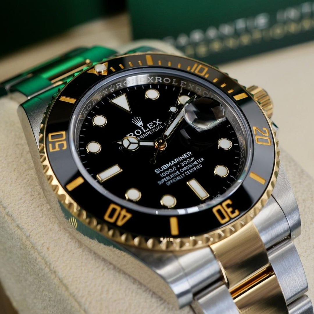 Rolex Submariner Date Black and Gold Oyster