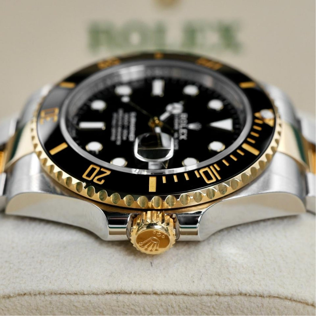 Rolex Submariner Date Black and Gold Oyster